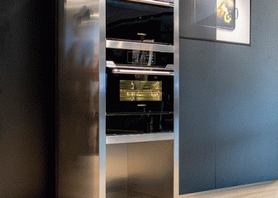 Open steel appliance housing created as a stand alone feature or fused in with designs.