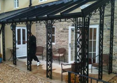 Wrought Iron Canopy Design With Optional Solar Integration.