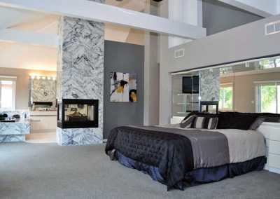 Modern Master Bedroom, Fireplace and Marble Finish.