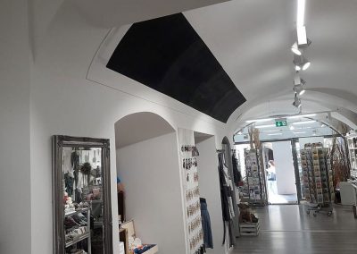 Angled Wall Installation In Shop Space.