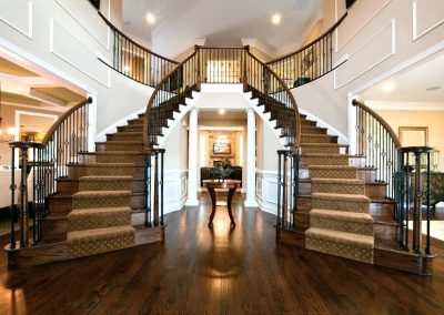 Double Staircase With Timber & Imperial Carpet Design.