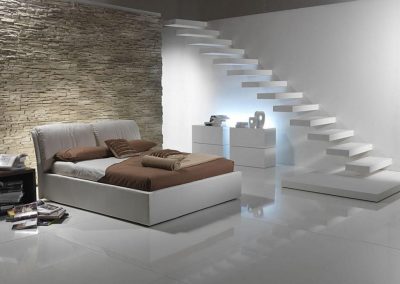 Exclusive Basement Bedroom with White Floating Staircase.